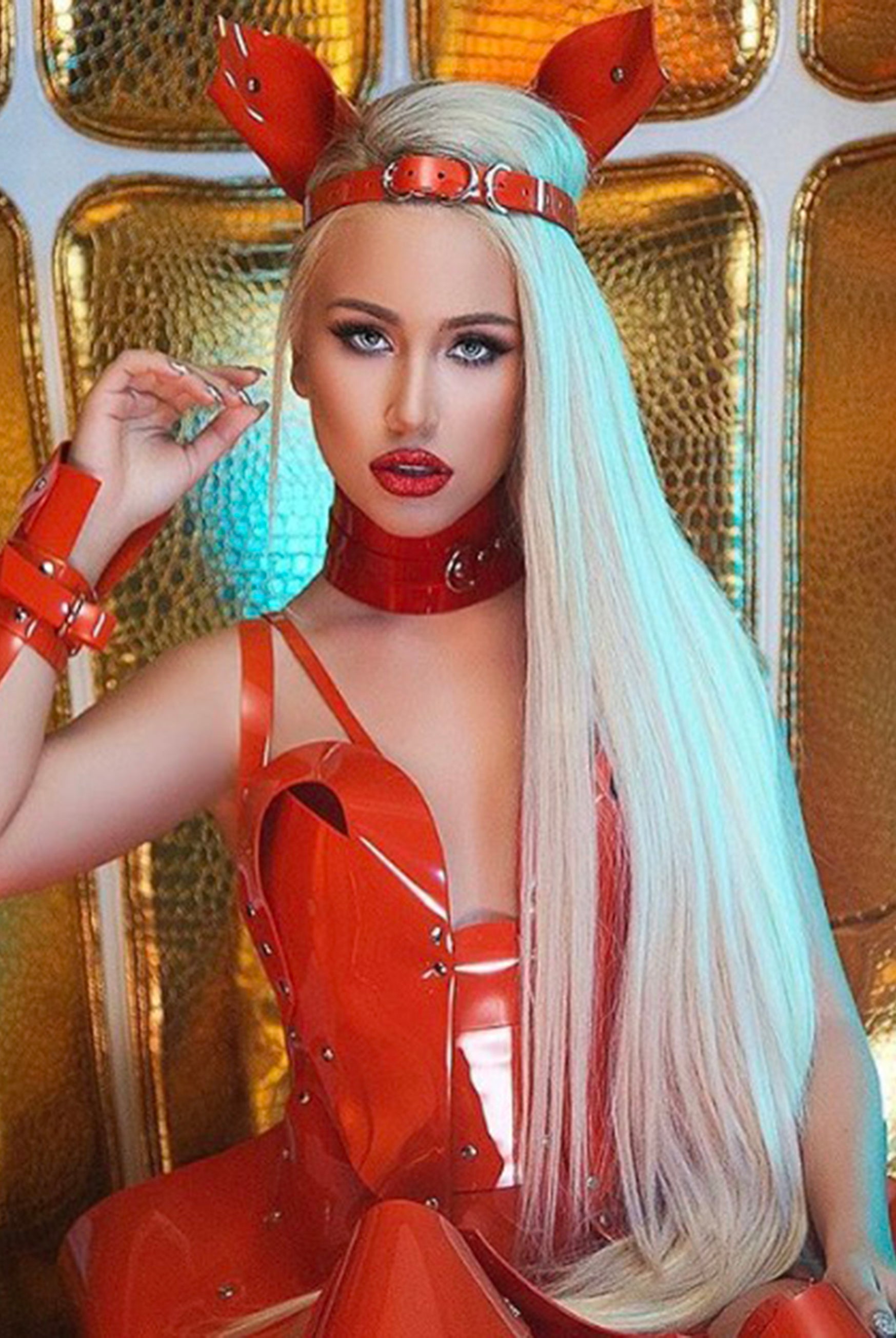 Gery Nikol wearing custom Jivomir Domoustchiev orange dress