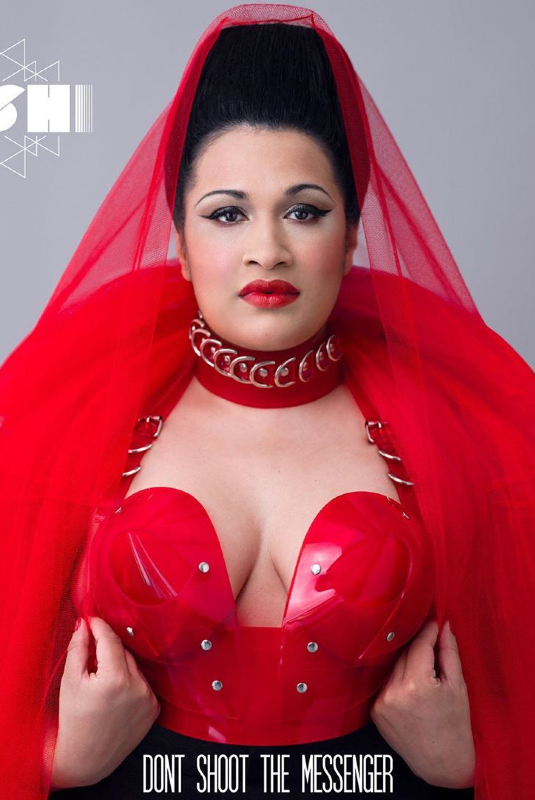 Bishi wearing Atelier Jivomir Domoustchiev transparent red sculpture bustier