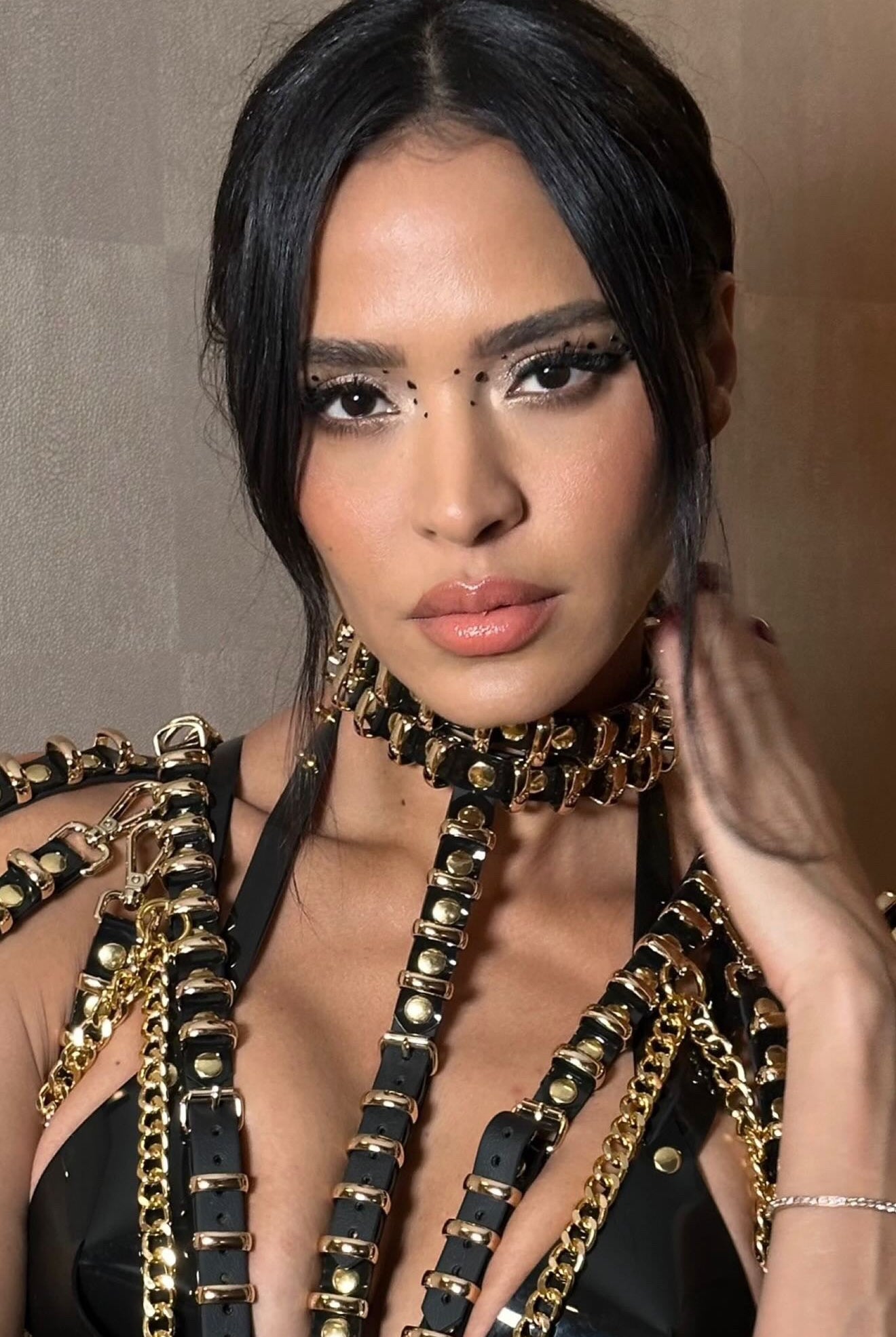 Leila Ben Khalifa wearing ATÉLIER JIVOMIR Robo Purity Set in transparent red vegan vinyl in Miami