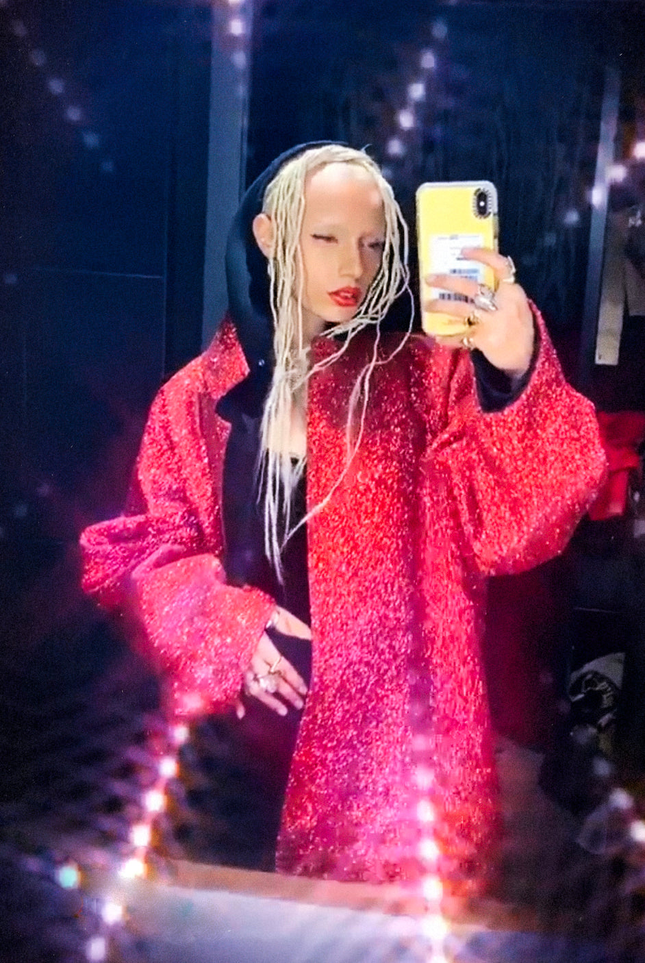 Uglyworldwide wearing Jivomir Domoustchiev red glitter coat PFW