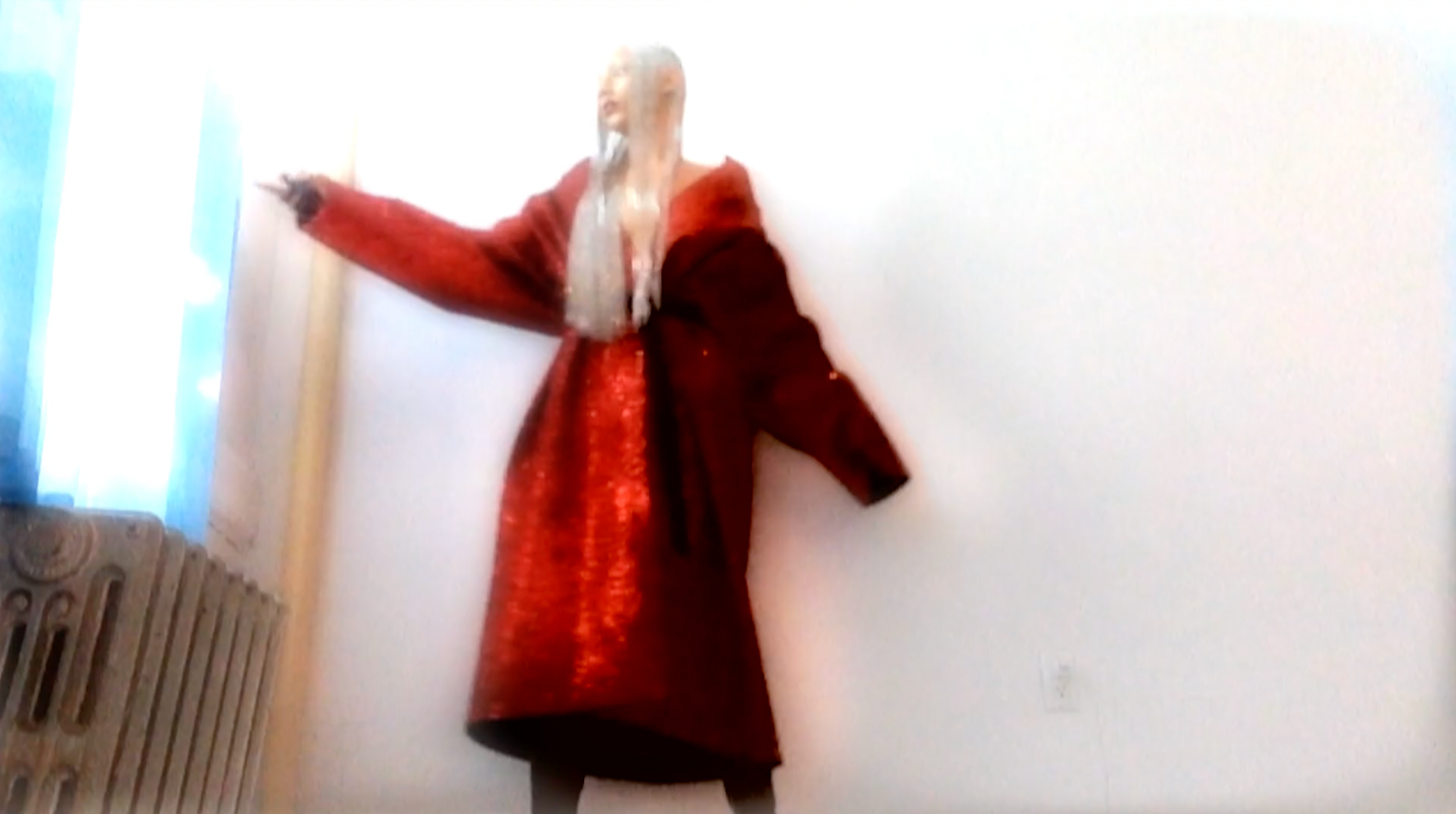 Jazzelle Z wearing Jivomir Domoustchiev glitter coat