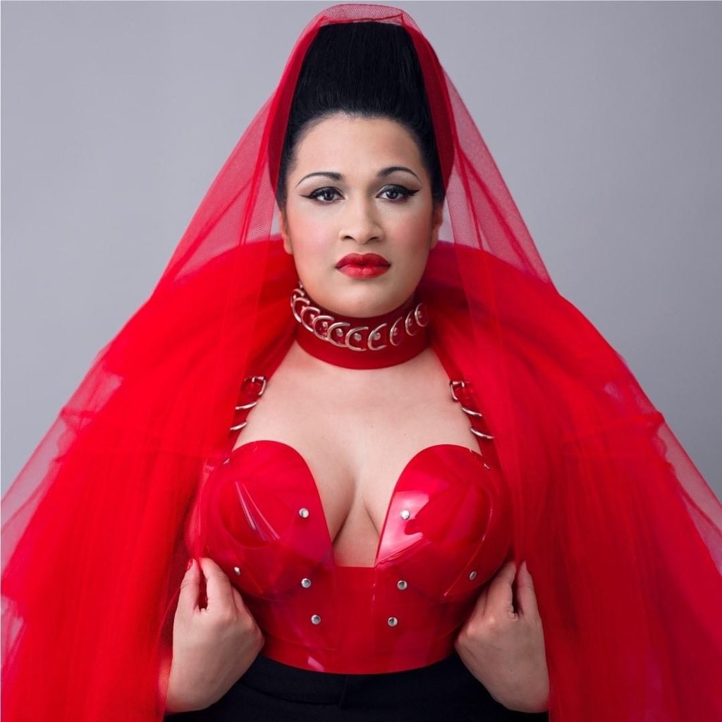 Bishi wearing ATÉLIER JIVOMIR multi ring vegan vinyl choker collar full look