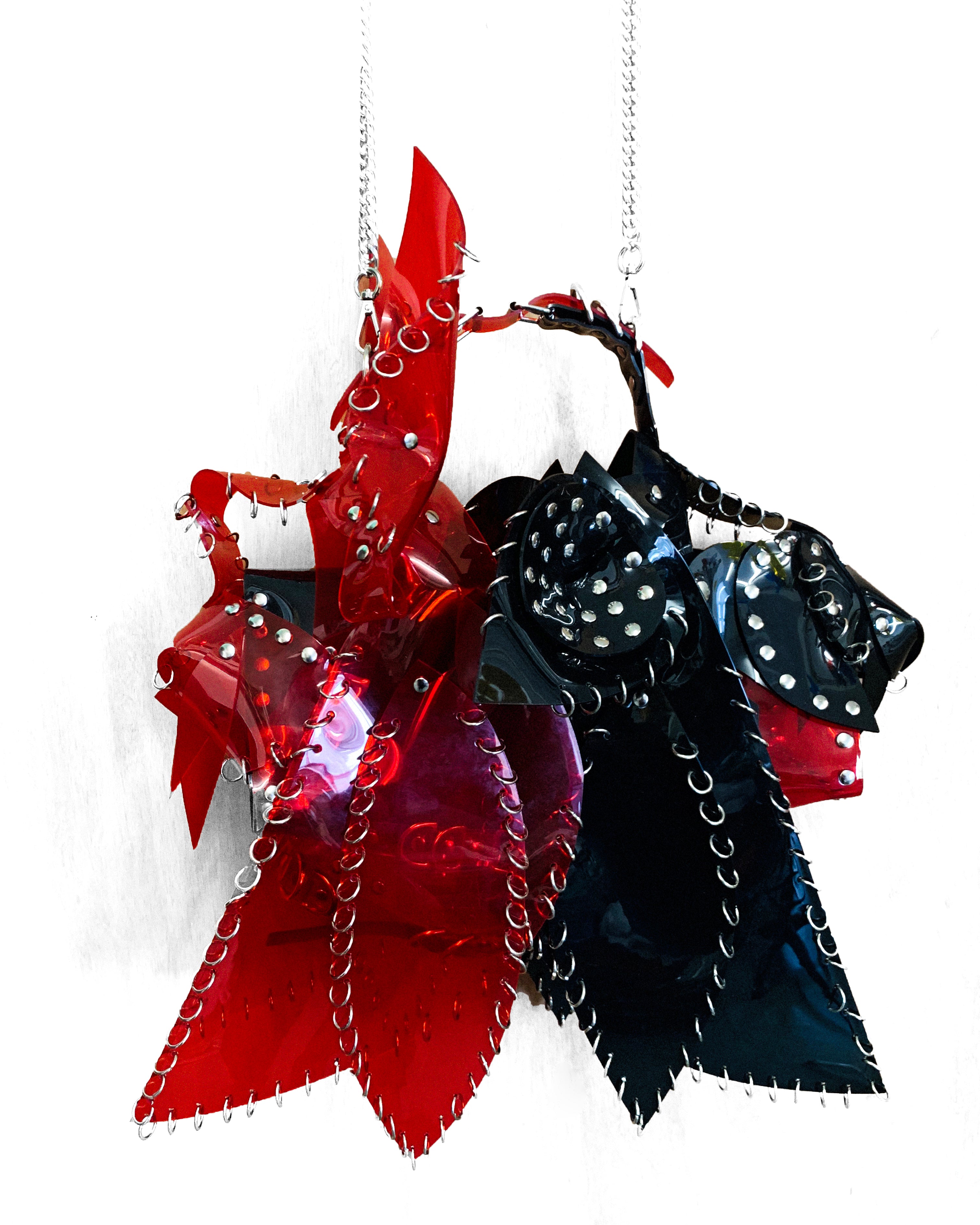 The Jivomir Domoustchiev "Two Face" Spirit Animal handbag.  Both animal headpieces in this bag are independently wearable art vegan vinyl handbag purse
