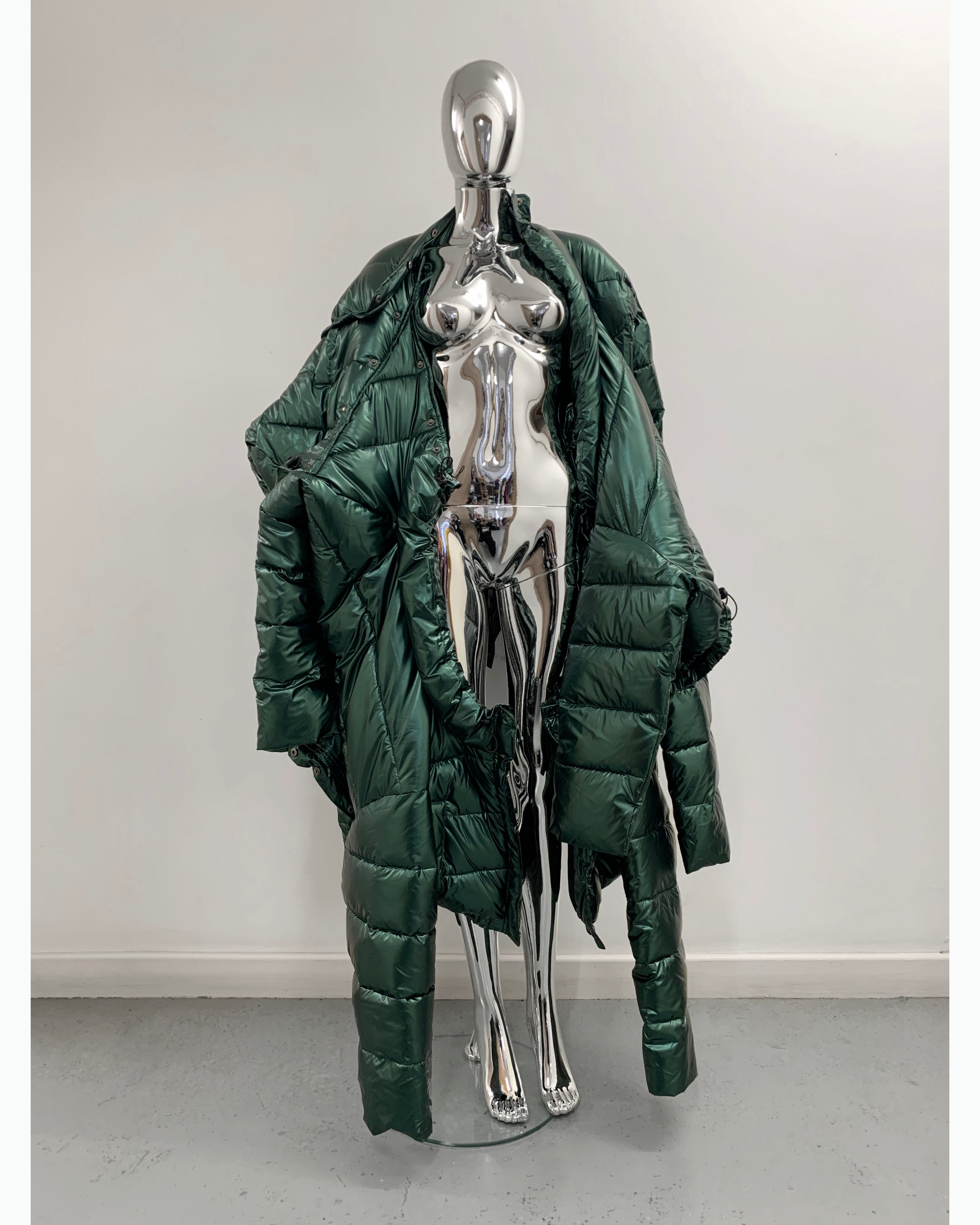 Jivomir Domoustchiev repurposed re designed sculpture future fashion hand crated from unwanted garments puffs coat sculpture design future fashion redesign