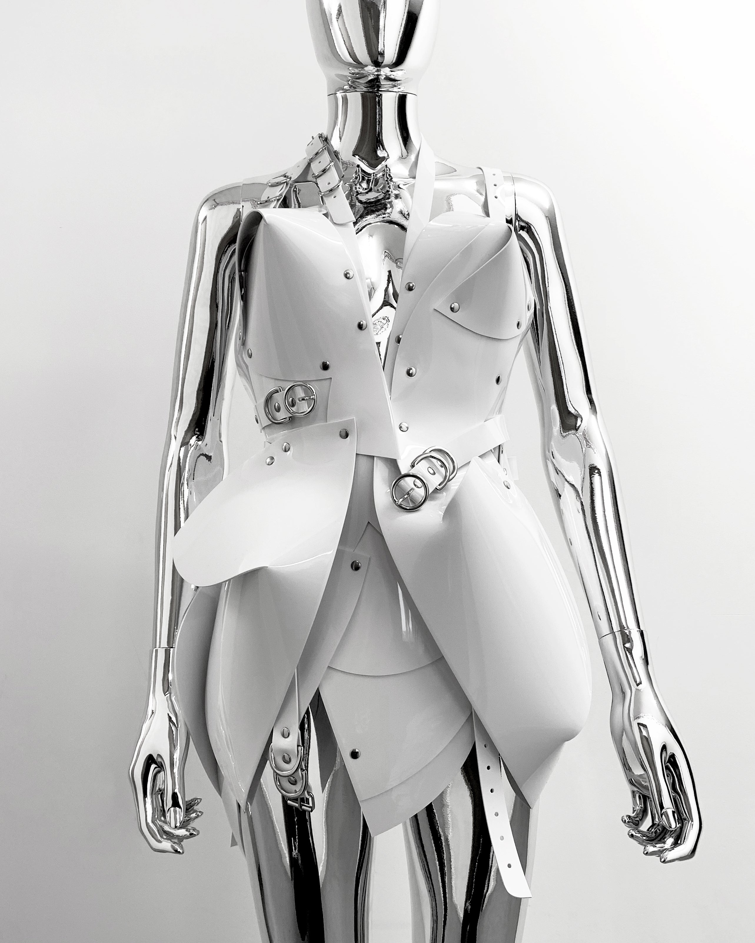 Perfect little Asymmetric Thoughts Dress sculpture dress. The all new 'Onna Bugeisha' collection dress lovingly made to order in our east London atelier in vegan vinyl and available in a variety of stunning colours and studding details.