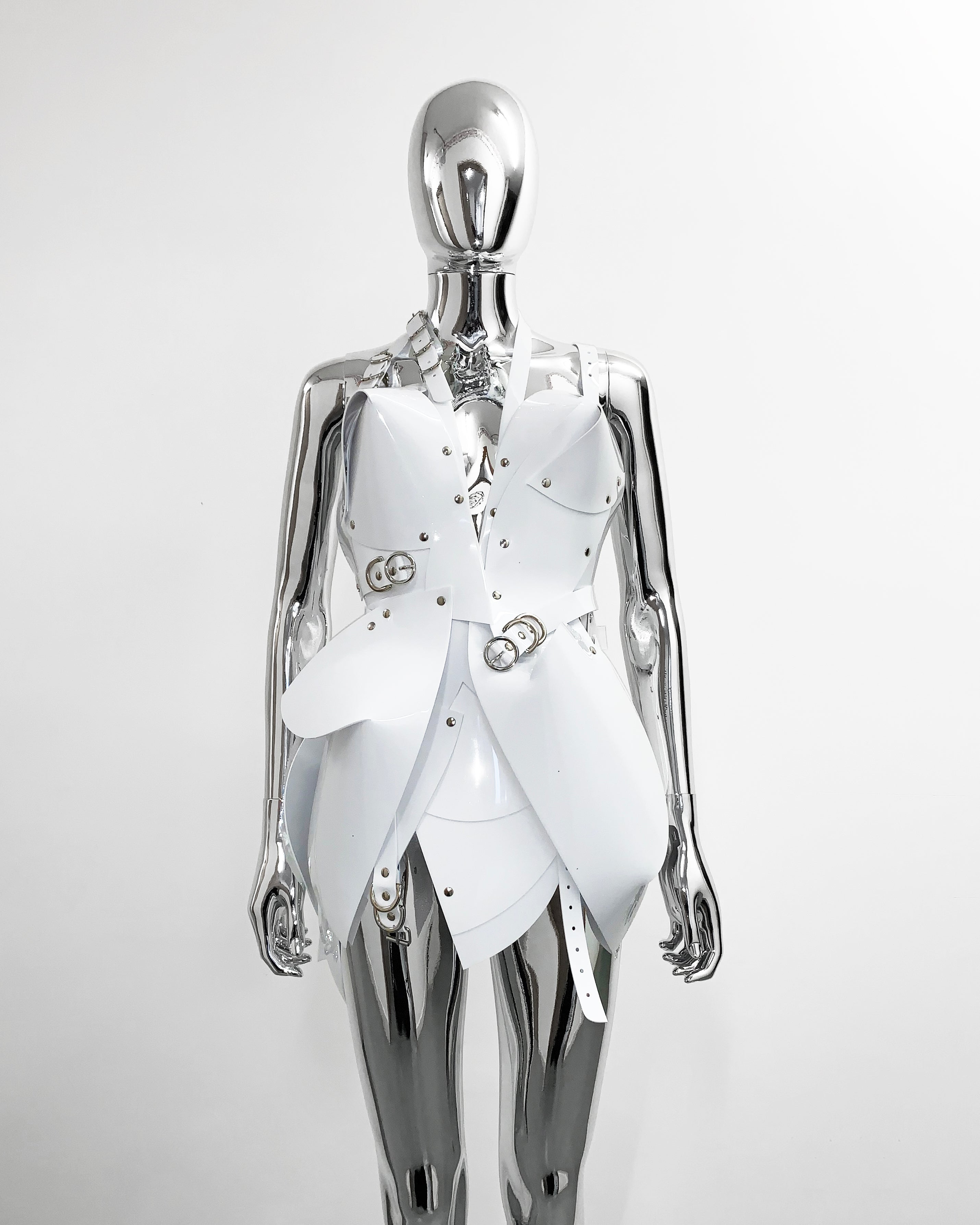 Perfect little Asymmetric Thoughts Dress sculpture dress. The all new 'Onna Bugeisha' collection dress lovingly made to order in our east London atelier in vegan vinyl and available in a variety of stunning colours and studding details.