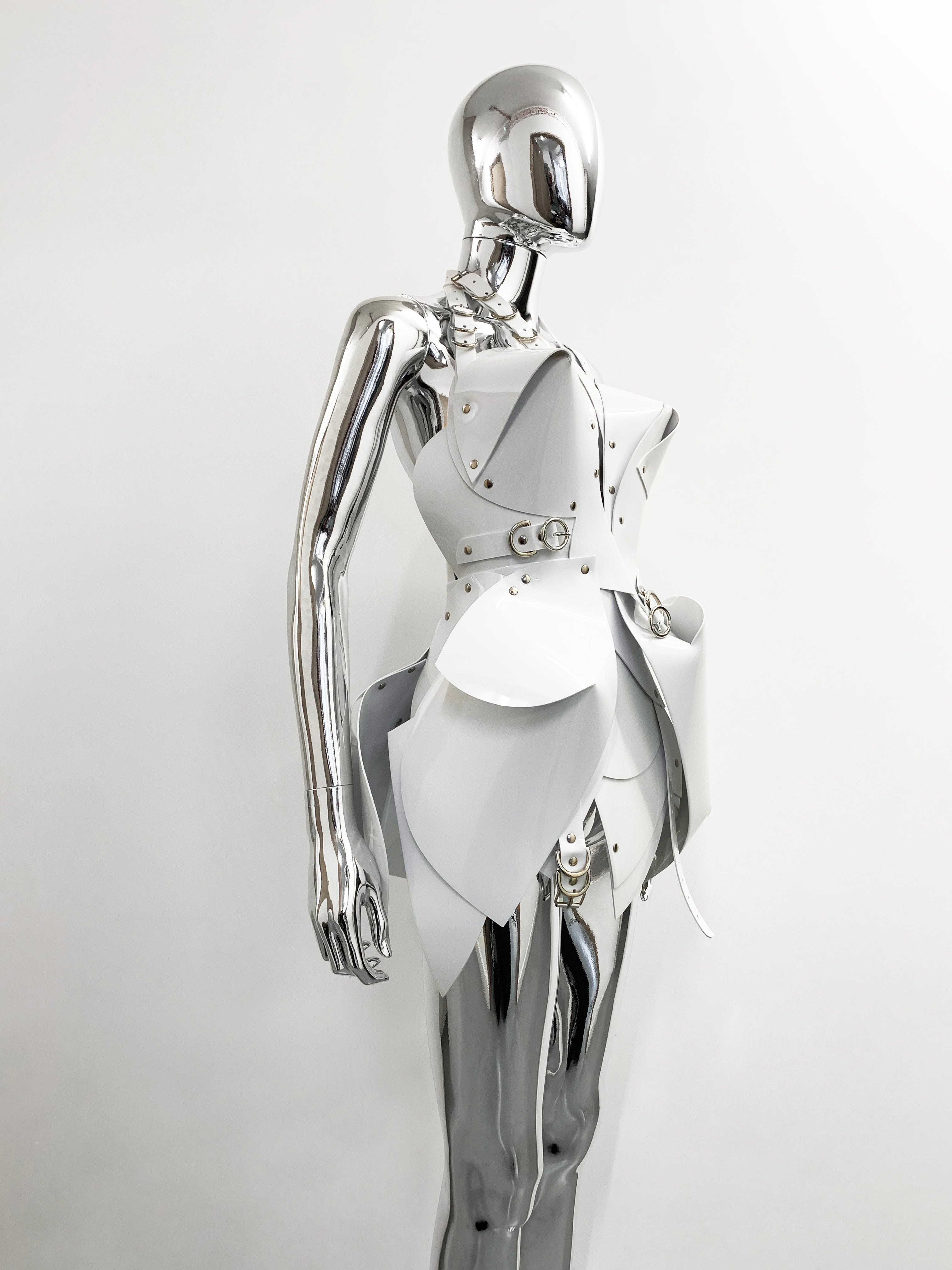 Perfect little Asymmetric Thoughts Dress sculpture dress. The all new 'Onna Bugeisha' collection dress lovingly made to order in our east London atelier in vegan vinyl and available in a variety of stunning colours and studding details.