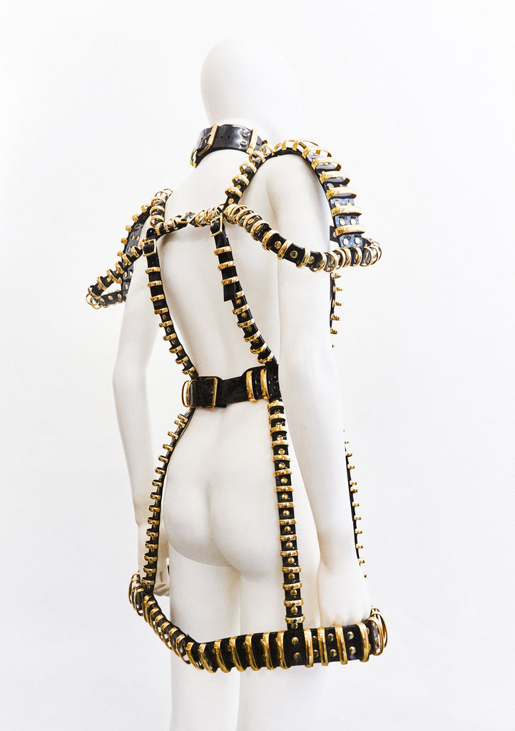 Jivomir Domoustchiev multi ring harness dress gold tone