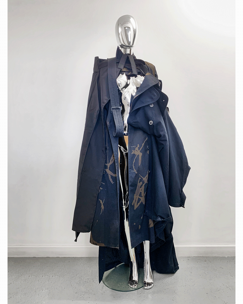 Jivomir Domoustchiev hand crafted re purposed sculpture trench coat hand crafted from re purposing coats and creating a beautiful collectible sculpture
