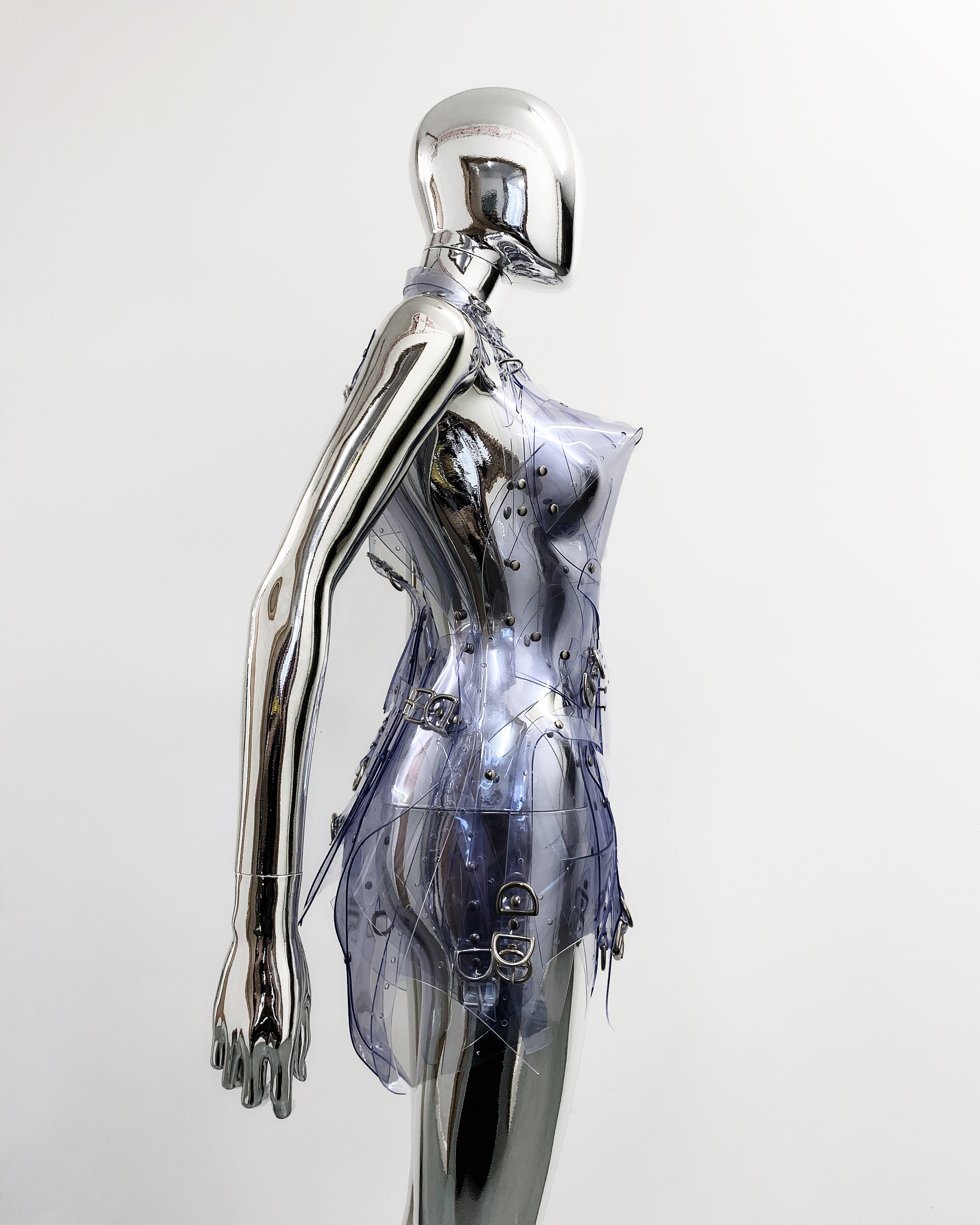 'Onna Bugeisha' collection Jivomir Domoustchiev Asymmetric Dreams Dress dress lovingly made to order in our east London atelier in vegan vinyl and available in a variety of stunning colours and studding details. An artist expression of excessive buckling and pure asymmetrical balance