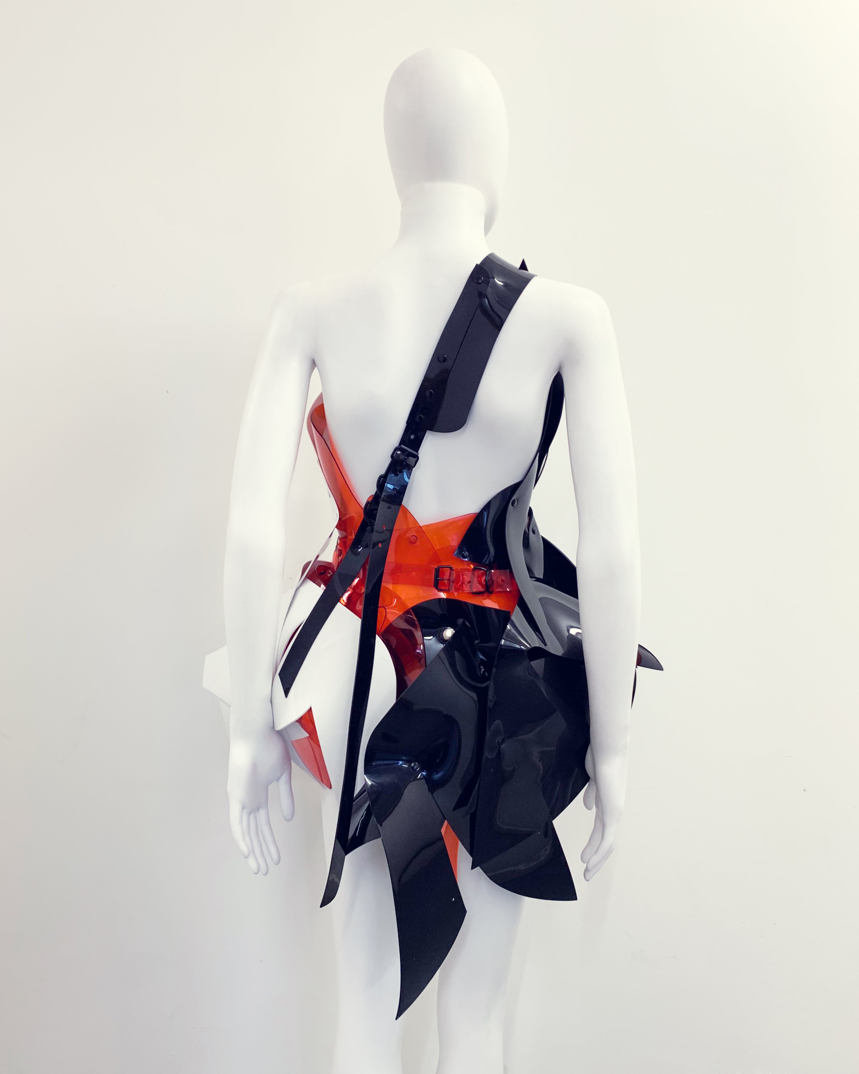 'Onna Bugeisha' collection Jivomir Domoustchiev Are Colore Dress lovingly made to order in our east London atelier in vegan vinyl and available in a variety of stunning colours and studding details. An artist expression pure asymmetrical balance wear as a dress or display as a sculpture