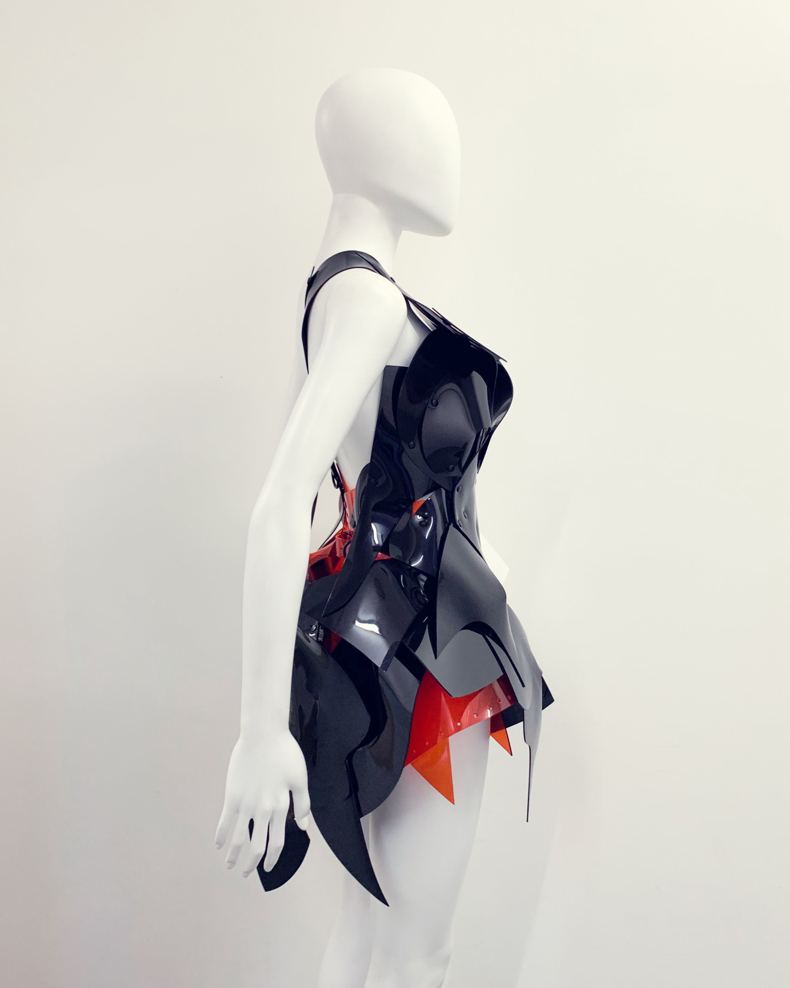 'Onna Bugeisha' collection Jivomir Domoustchiev Are Colore Dress lovingly made to order in our east London atelier in vegan vinyl and available in a variety of stunning colours and studding details. An artist expression pure asymmetrical balance wear as a dress or display as a sculpture