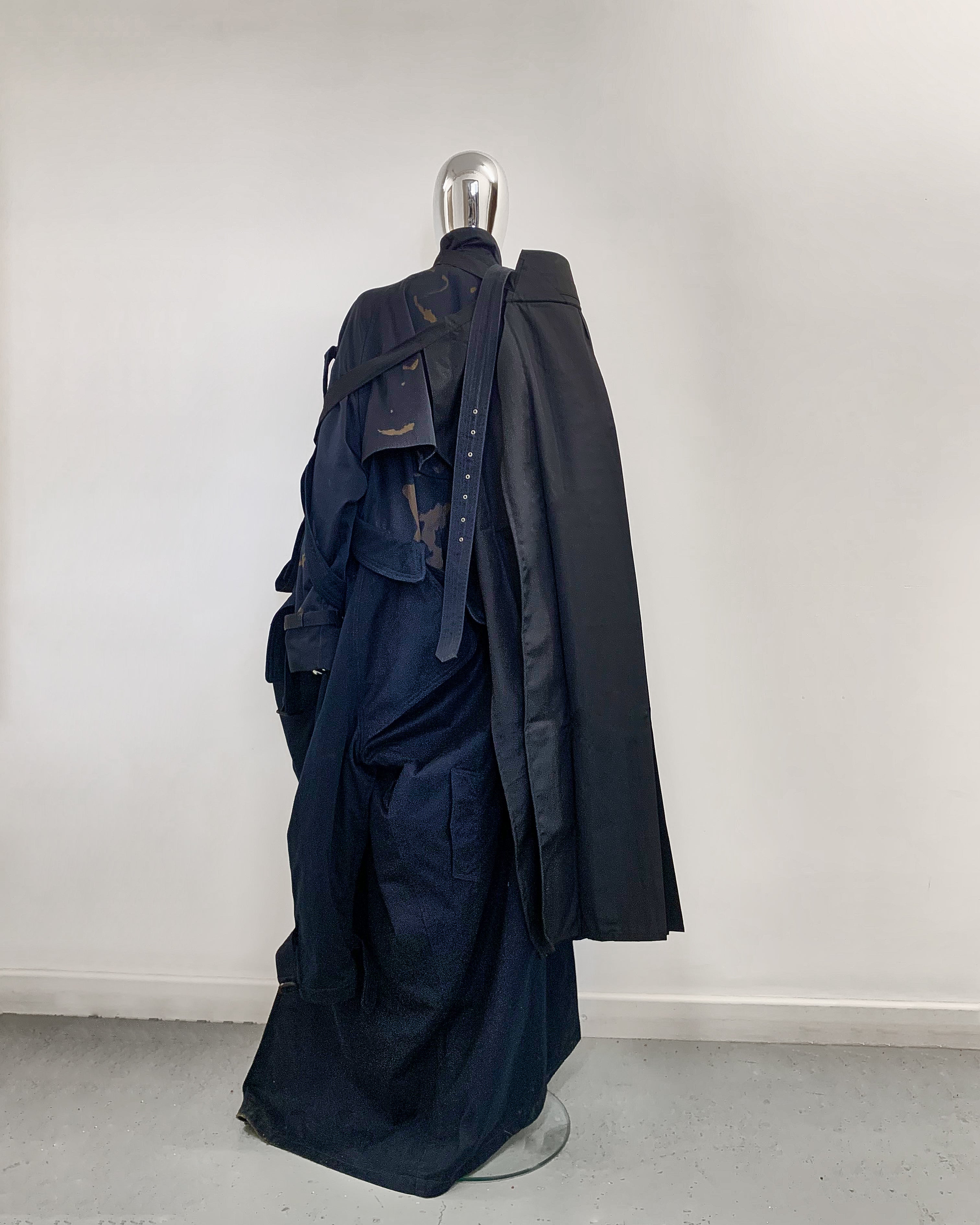 Jivomir Domoustchiev hand crafted re purposed sculpture trench coat Jivomir Domoustchiev hand crafted re purposed sculpture trench coat  hand crafted from re purposing coats and creating a beautiful collectible sculpture