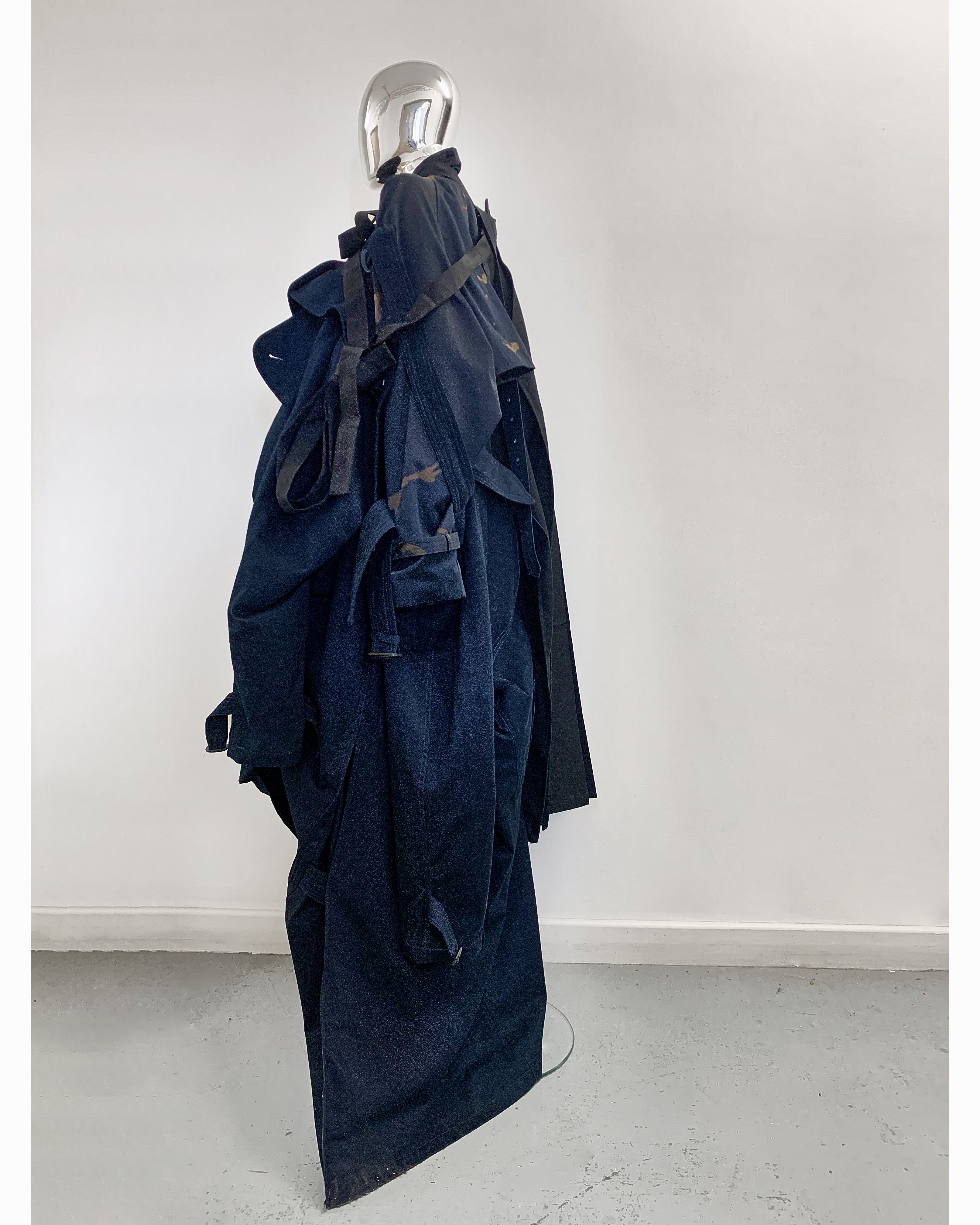 Jivomir Domoustchiev hand crafted re purposed sculpture trench coat Jivomir Domoustchiev hand crafted re purposed sculpture trench coat  hand crafted from re purposing coats and creating a beautiful collectible sculpture