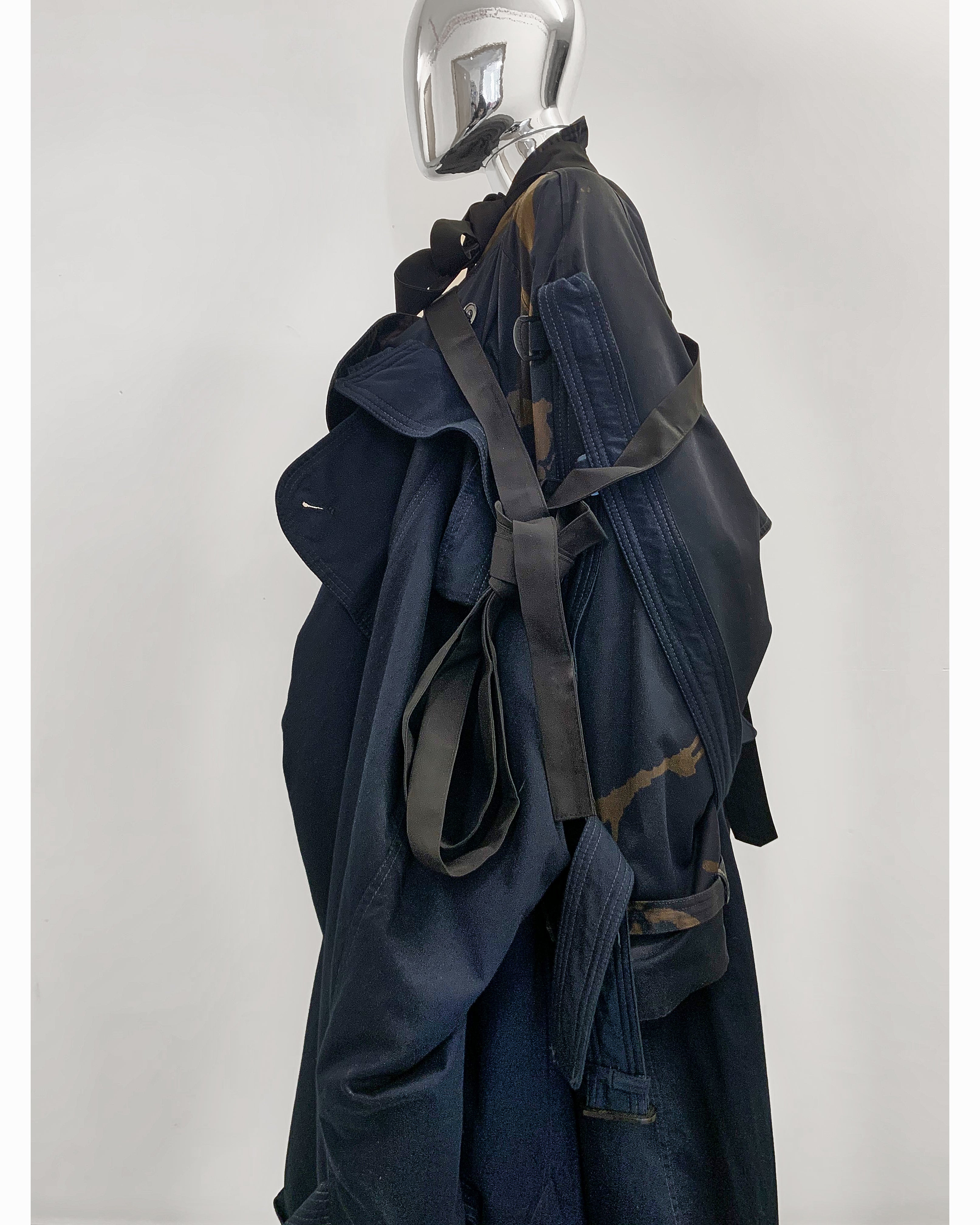 Jivomir Domoustchiev hand crafted re purposed sculpture trench coat Jivomir Domoustchiev hand crafted re purposed sculpture trench coat  hand crafted from re purposing coats and creating a beautiful collectible sculpture