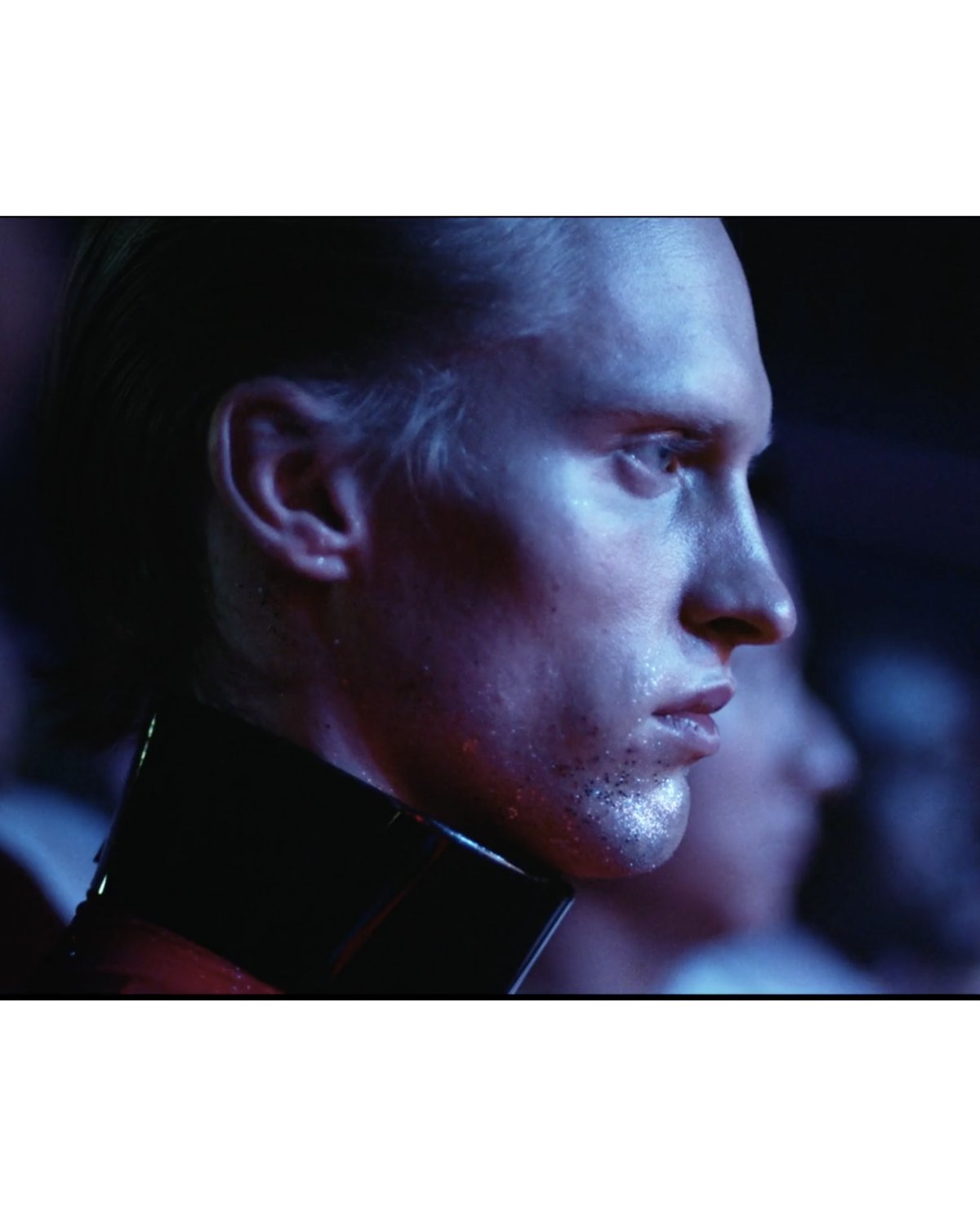 Jivomir Domoustchiev iconic vinyl chocker as seen in the Year and Years Sanctify video. available in a variety of colours. Simple yet striking adjustable for comfort. Finished with silver look studding & buckle. Complements any outfit.