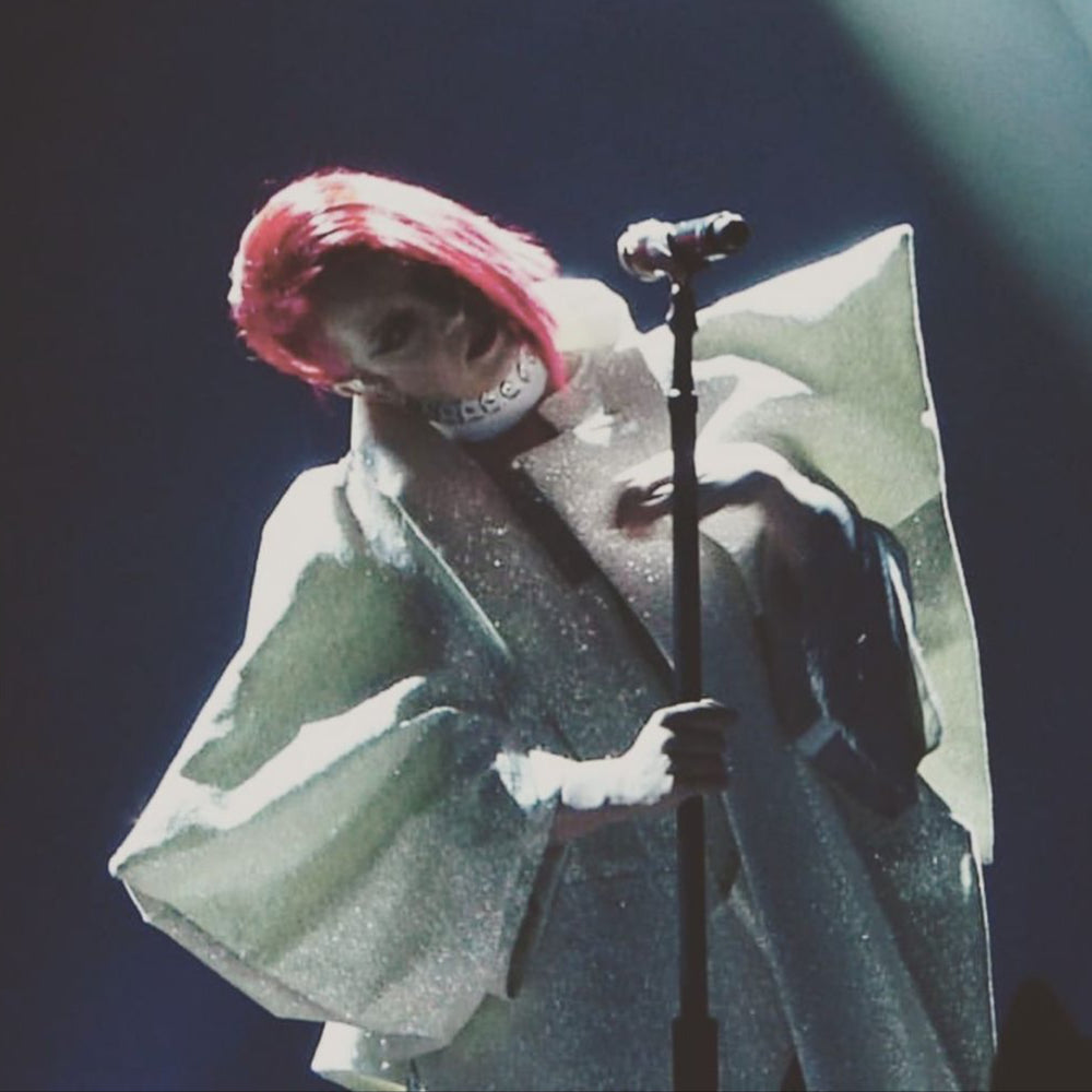 Garbage Shirley Manson wearing ATÉLIER JIVOMIR multi ring vegan vinyl choker collar full look white glitter star coat