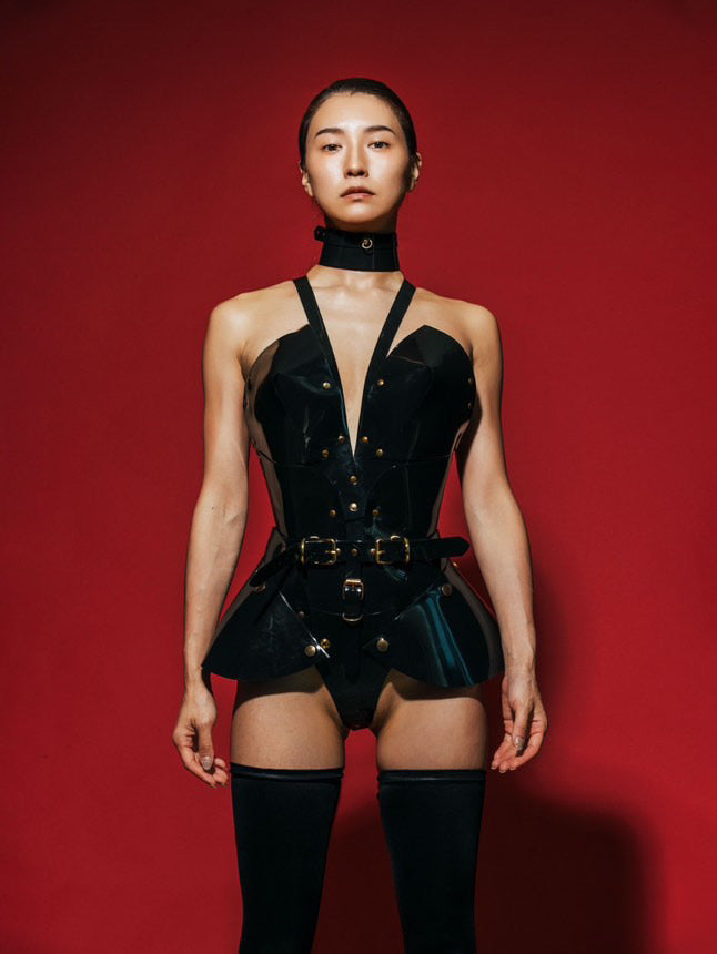 Miss Japan Aimi Feti photographed by Saeho Kim wearing ATÉLIER JIVOMIR black vegan vinyl sculpture Hipster