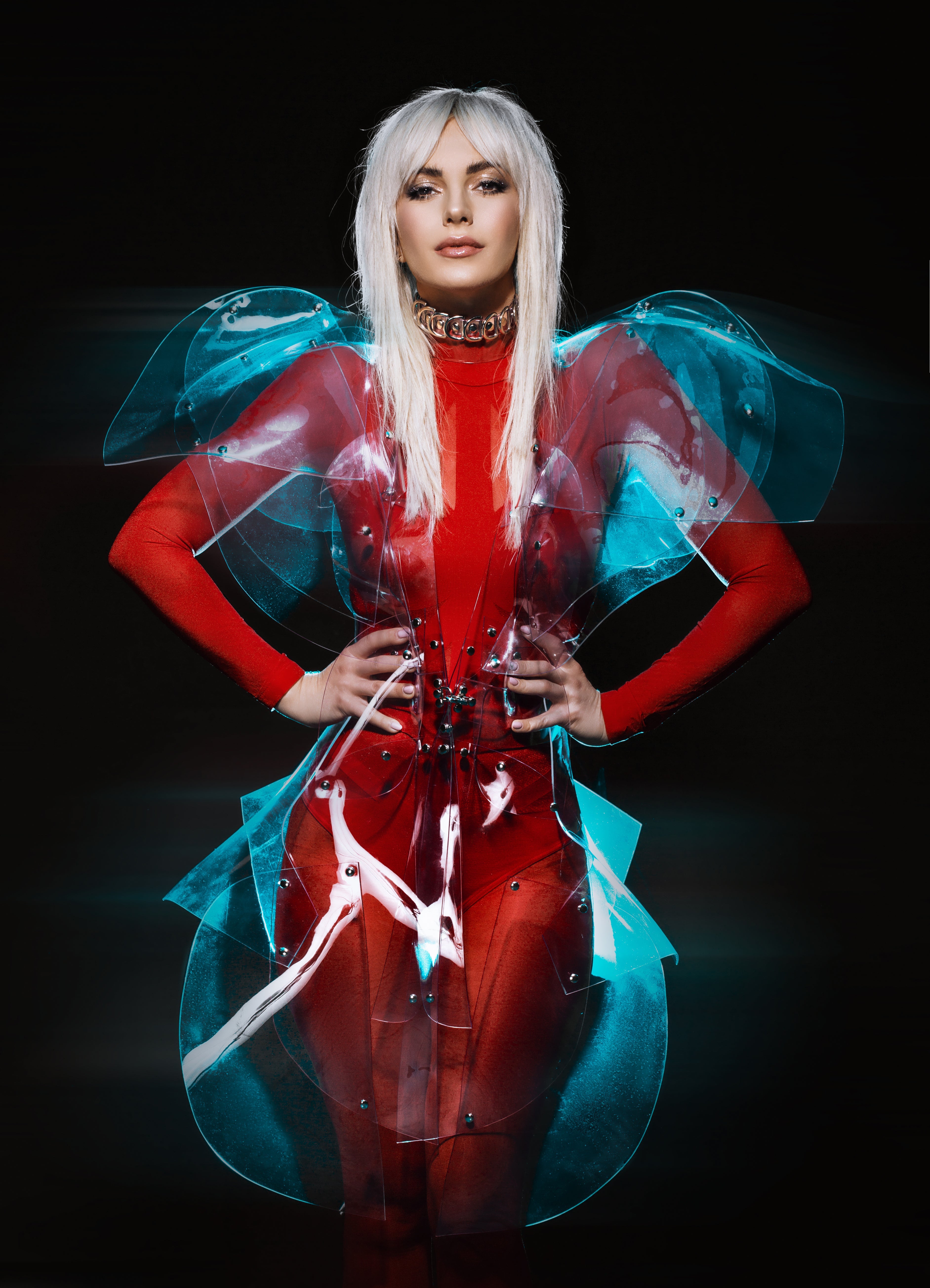 Bulgarian Recording Artist Poli Genova wearing ATÉLIER JIVOMIR Galaxy Sculpture Dress in Clear Vinyl