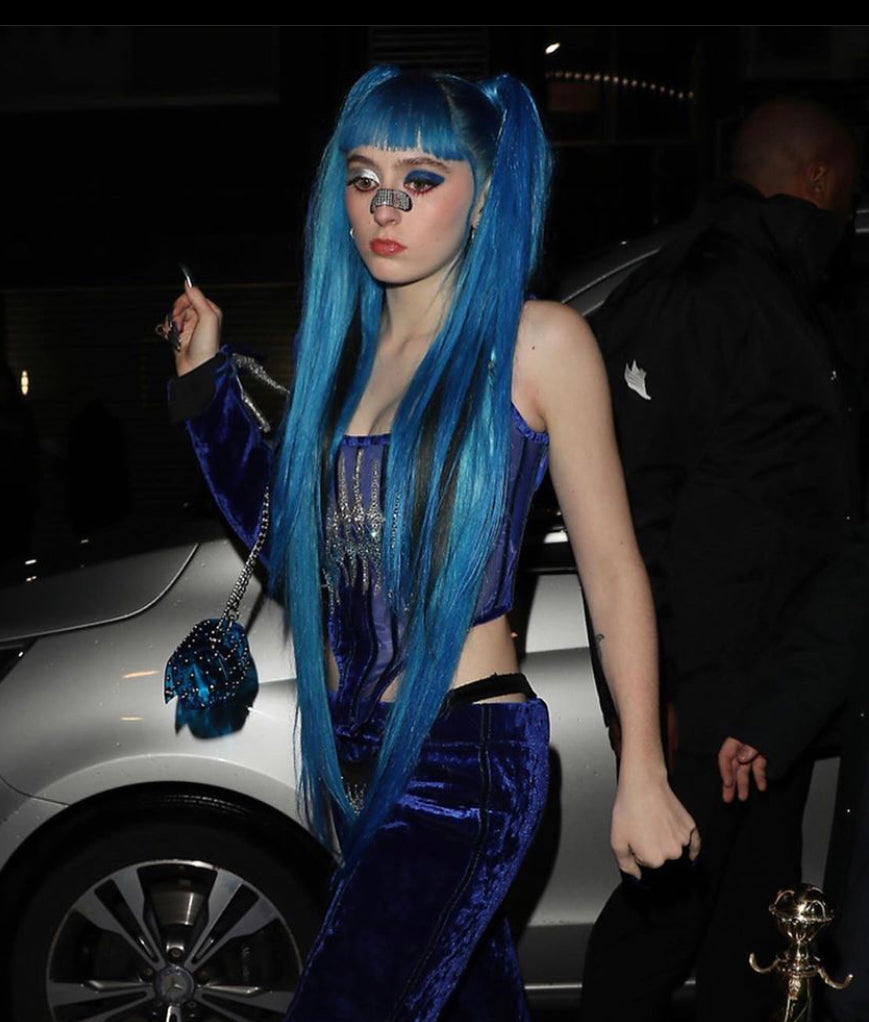 Ashnikko at The Brit Awards with the Jivomir Domoustchiev custom clear blue studded 'The Secret' Bag