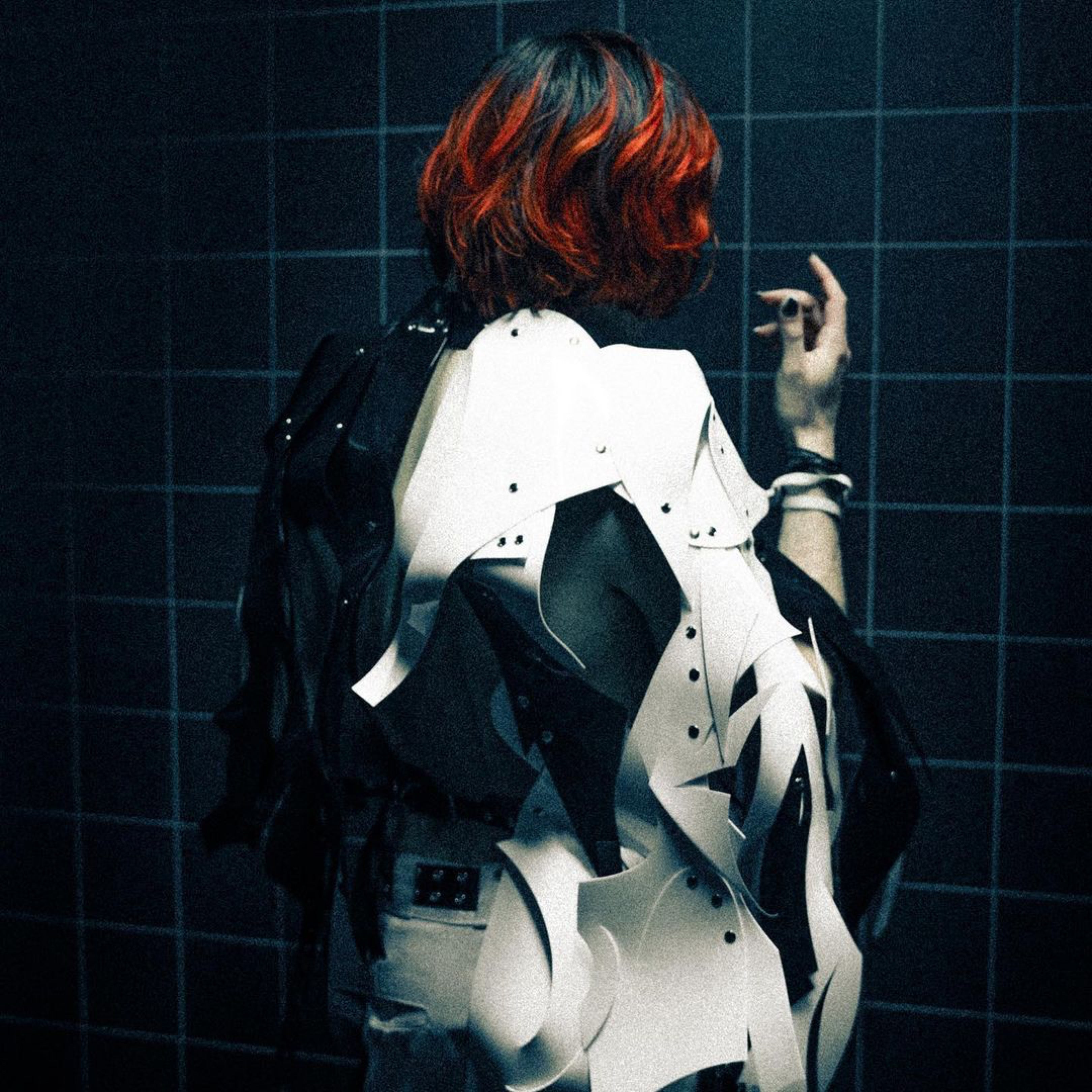 Olli Appleyard wearing Jivomir Domoustchiev asymmetric sculpture vegan vinyl art expression future fashion jacket 