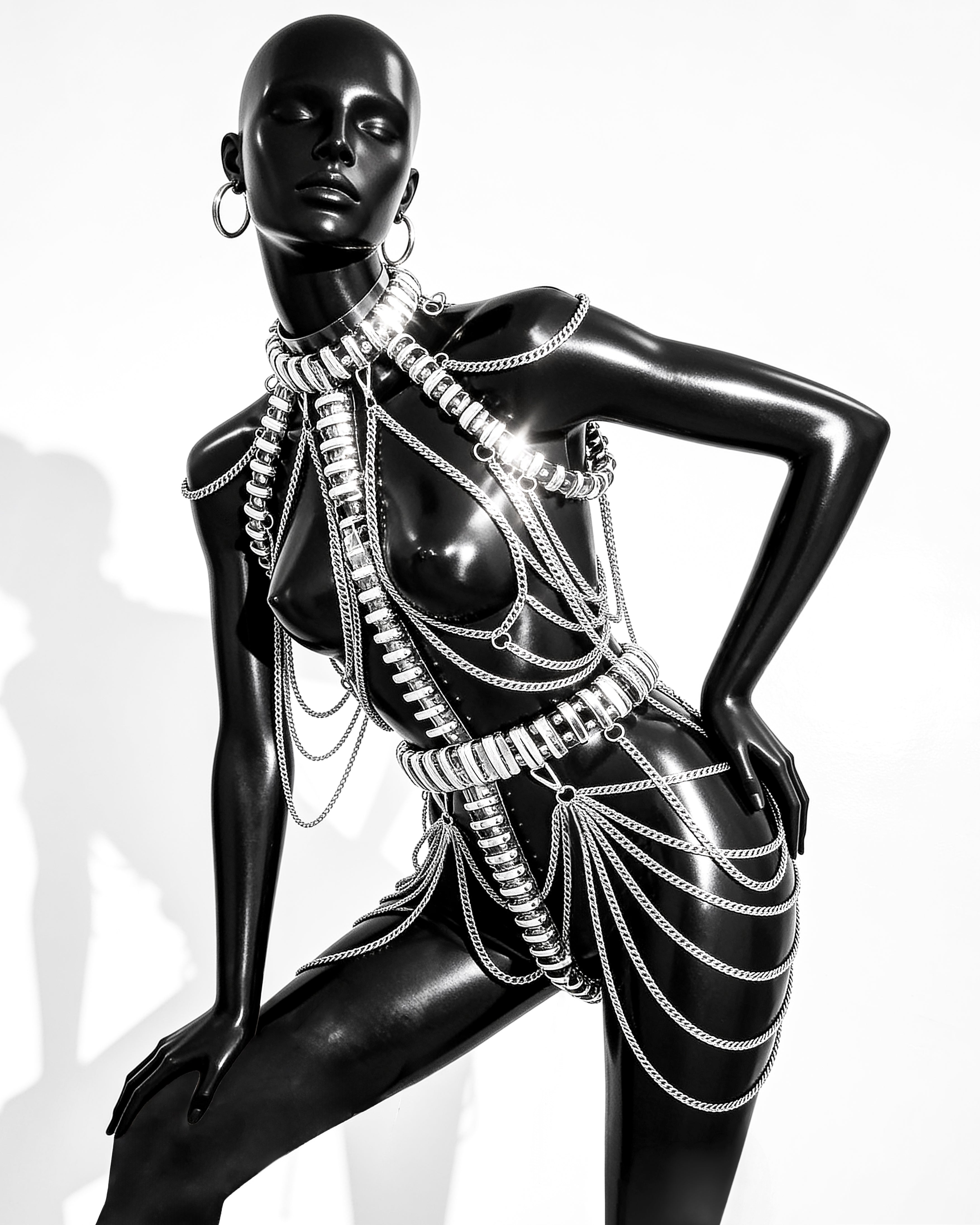 ATÉLIER JIVOMIR CRAZY MULTI CHAIN RING HARNESS DRESS IN CLEAR VINY AND SILVER ON MANNEQUIN