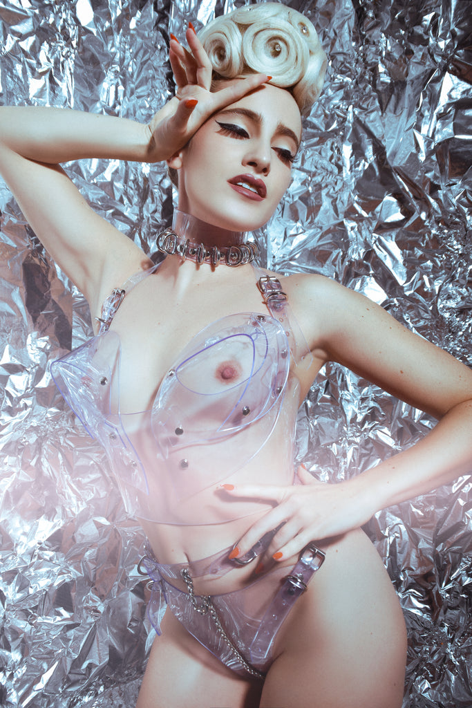 Tosca Rivola in Playboy magazine wearing Jivomir Domoustchiev transparent vegan vinyl pvc bra knickers and multi ring collar set